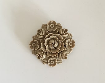 1950s plastic/ Celluloid   rose brooch