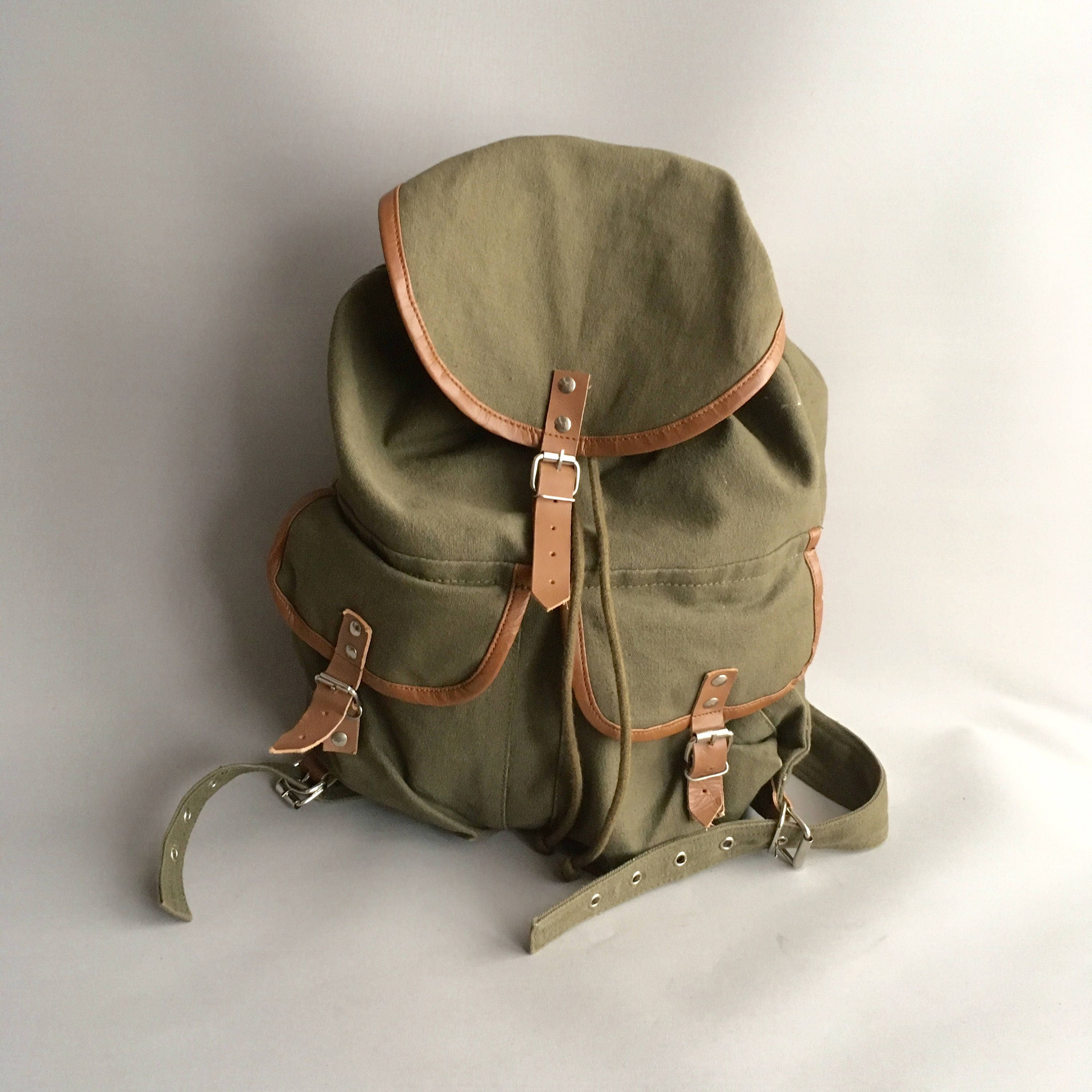 green leather rucksack
