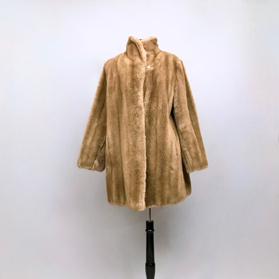 Astraka faux fur coats Clearance