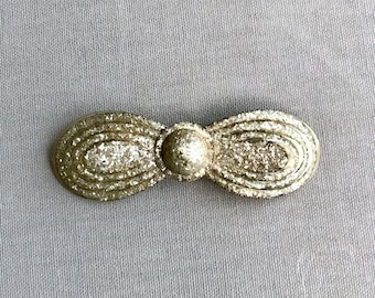1930s  gold glitter plastic Bow brooch Art Deco