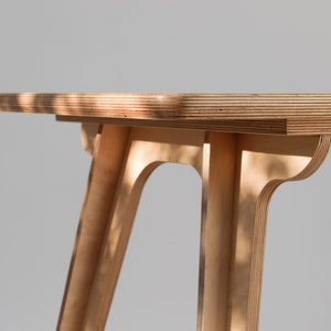 Compact birch ply office desk styled with chair and accessories, perfect for home office decor