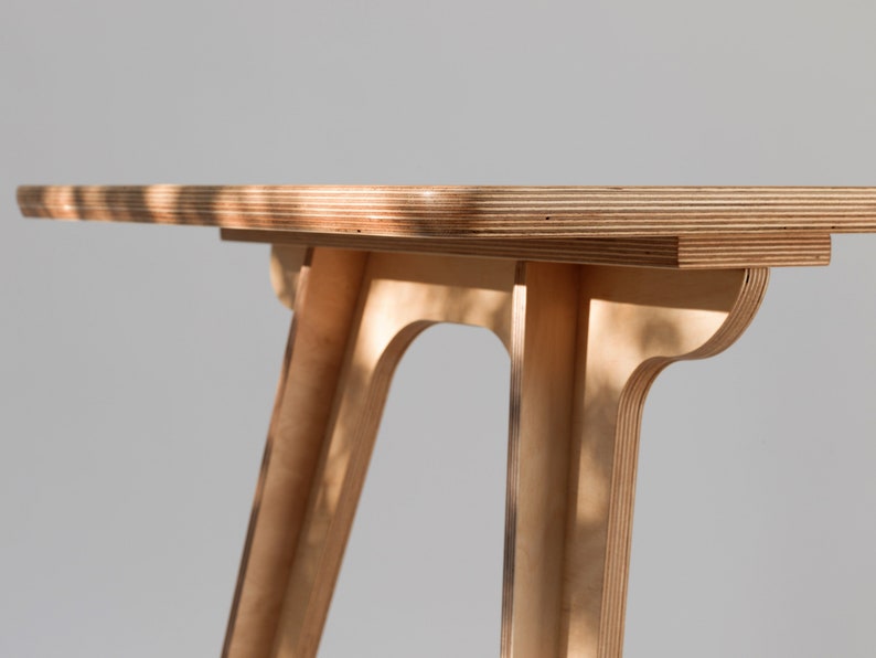 Compact birch ply office desk styled with chair and accessories, perfect for home office decor