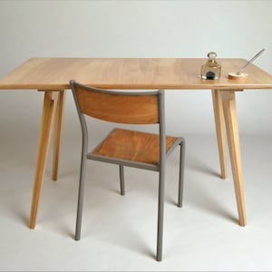 Mid century modern birch ply desk with minimalist design, ideal for home office or student workspace