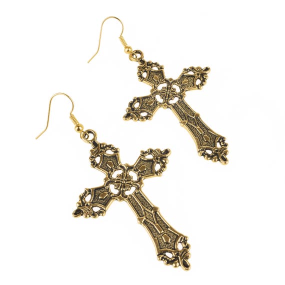 A PAIR OF LARGE SILVER COLOUR CRYSTAL CROSS CRUCIFIX MADONNA EARRINGS NEW.