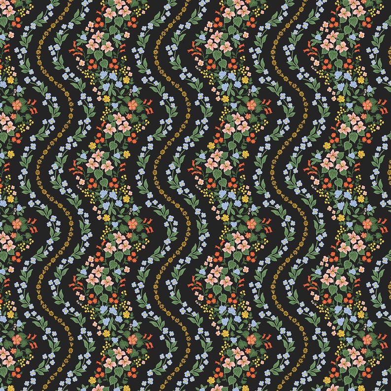 May include: A repeating pattern of colorful flowers and foliage on a black background. The design features clusters of pink, blue, yellow, and orange flowers, with green leaves and stems. Wavy lines of gold dots add a decorative element.