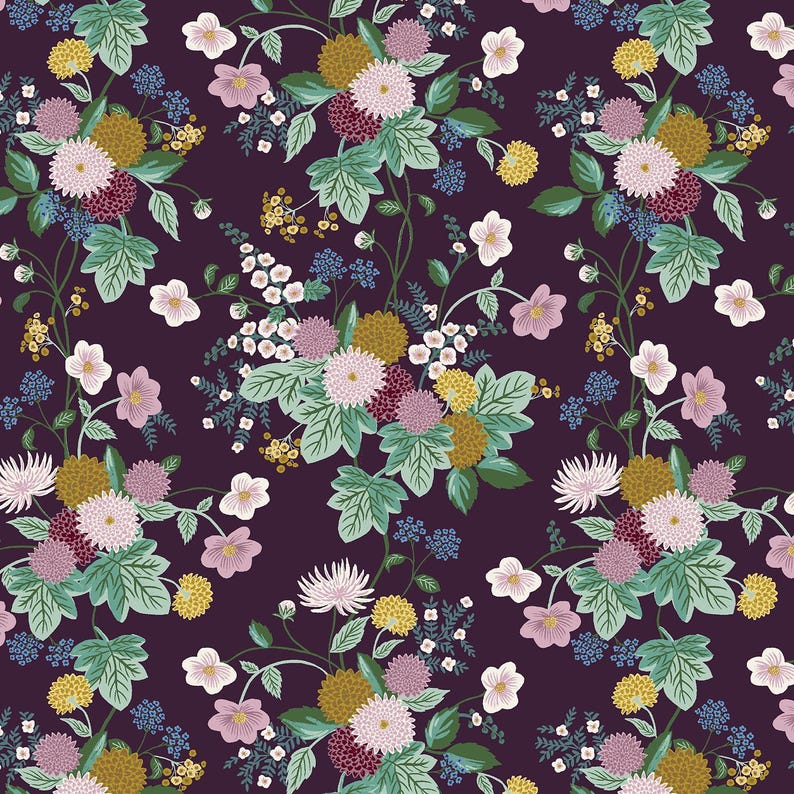 May include: A floral pattern featuring a deep purple background with repeating clusters of flowers. The flowers include shades of pink, yellow, white, and burgundy, with green leaves and small blue accents. The design is detailed and intricate.