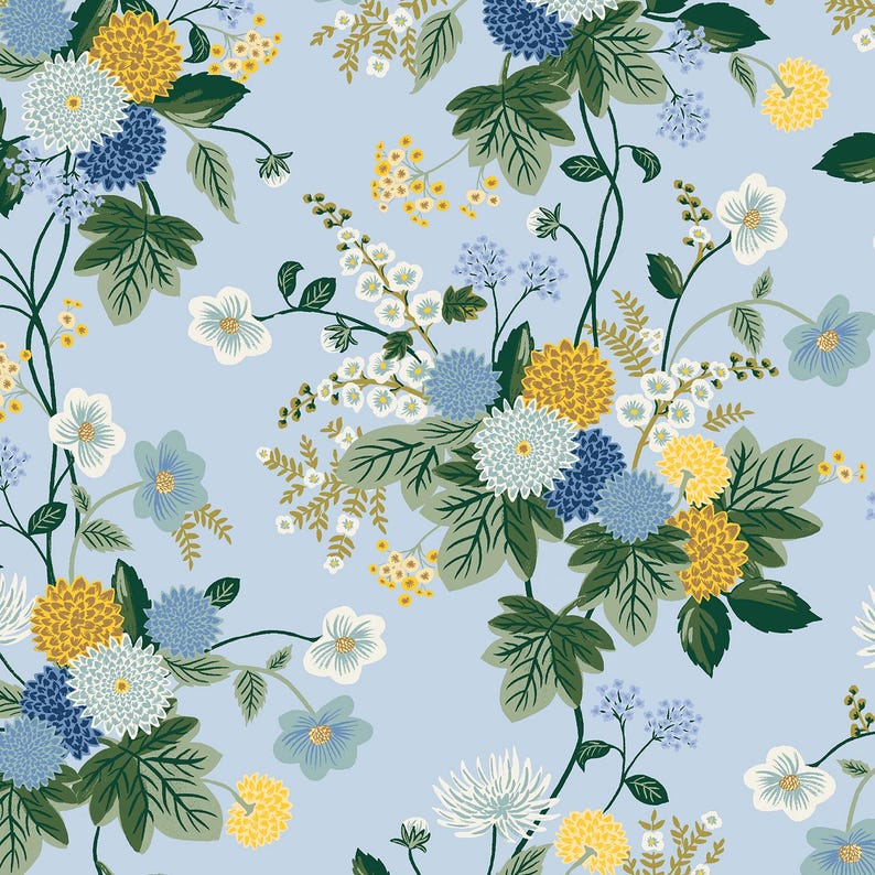 May include: Floral pattern featuring clusters of yellow, blue, and white flowers with green leaves on a light blue background. The design includes various flower types and detailed foliage, creating a seamless, repeating pattern suitable for fabric or wallpaper.
