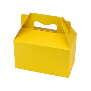 May include: A bright yellow cardboard box with a handle. The box is designed for carrying small items.