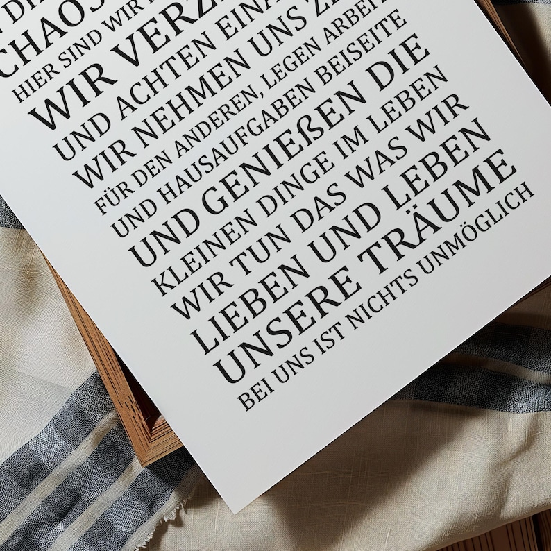 May include: A white poster with black text that reads "D Chaos Here We Are We Turn And Pay Attention To Each Other, We Take On Ourselves, We Put Work And Homework Aside And Enjoy The Little Things In Life, We Do What We Love And Live Our Dreams, With Us Nothing Is Impossible."