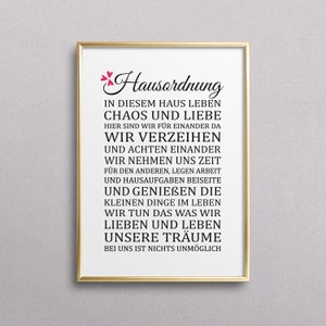 May include: A framed print with a white background and black text that reads "Hausordnung" in a decorative font. The text continues with a list of rules for living in a home, including "Chaos und Liebe", "Wir verzeihen", "Wir achten einander", "Wir nehmen uns Zeit", "Und geniessen die kleinen Dinge im Leben", "Wir tun das was wir lieben und leben unsere Tr&auml;ume", and "Bei uns ist nichts unm&ouml;glich".