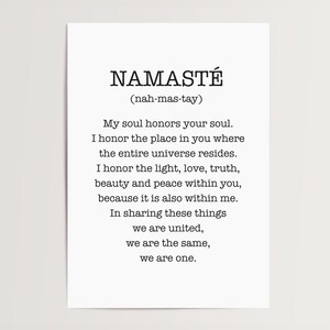 May include: Black and white typography print with the word "Namaste" and its pronunciation in parentheses. The print features a quote about honoring the soul and the universe.