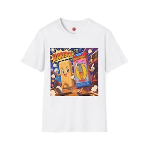 Puede incluir: Camiseta blanca con un gráfico de dibujos animados colorido. El gráfico incluye la palabra "HARIBOL" y dos personajes animados: un alimento rectangular sonriente y una caja de incienso Gopi Chandan. El diseño tiene una estética vibrante y juguetona.