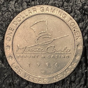Monte Carlo Resort And Casino Las Vegas NV One Dollar Chip Silver Tone Token T1996