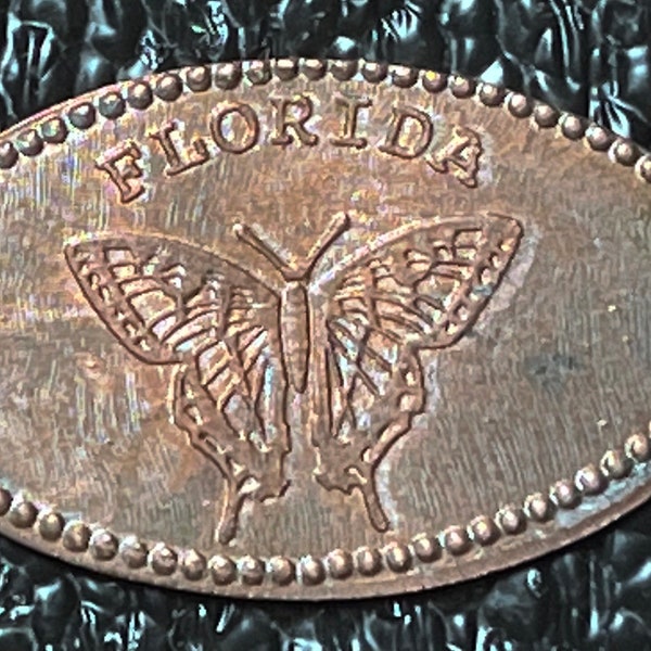 Butterfly Museum of Science and Industry Mosi Tampa elongated penny keepsake penny Squished penny Tampa FL  HT11304