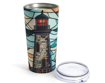 May include: Stainless steel tumbler with a colorful stained glass design of a lighthouse. The tumbler has a lid and is perfect for hot or cold beverages.