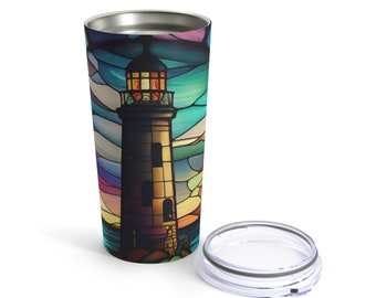 May include: A stainless steel tumbler with a colorful stained glass design of a lighthouse. The tumbler has a lid with a clear plastic lid.
