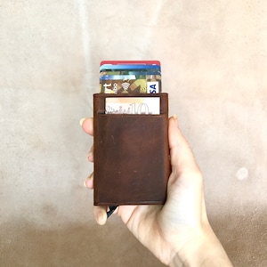 Portafoglio pop-up in pelle, portafoglio minimalista, porta carte di credito in metallo
