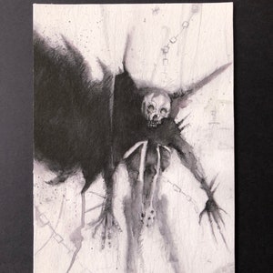 May include: A black and white ink drawing of a skeletal figure with a skull head, emerging from a dark, shadowy form. The figure has long, thin limbs and sharp claws. The background is a light gray with faint lines and dots.