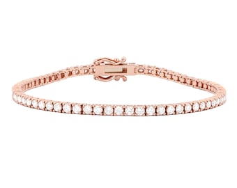 May include: Rose gold tennis bracelet with a row of round, clear gemstones. The bracelet features a secure clasp and is displayed against a white background. This elegant piece of jewelry is suitable for various occasions.