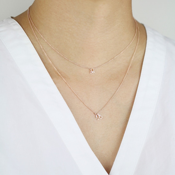 Diamond libra necklace deals