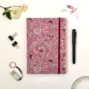 Liberty’s Pink Blossom Journal • A5 Size • Hardback Cover • Fabric Covered • Ruled Pages • Elastic Closure • Inner Pocket • Travel Journal
