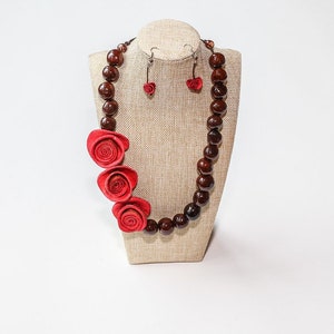 bombona seed necklace with 3 orange peel flower centerpiece with matching earrings