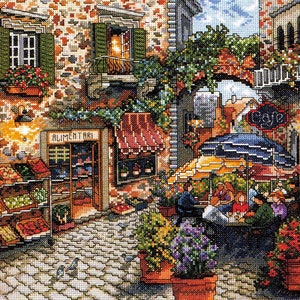 May include: A colourful painting depicting a European street scene with a cafe, a grocery store, and people seated at tables. The cafe has a sign that reads "Cafe" and the grocery store has a sign that reads "Alimentari".
