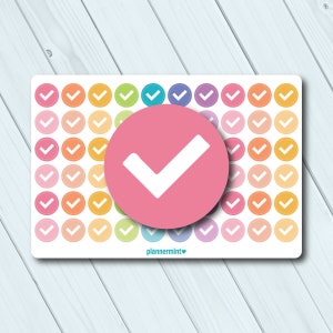 May include: A sheet of colorful planner stickers featuring a variety of pastel-colored circles, each with a white checkmark. A large pink circle with a white checkmark is centered on the sheet. The text "plannermint" is at the bottom.