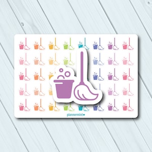 May include: A sheet of planner stickers featuring a cleaning theme. The stickers include images of buckets with bubbles and mops in various colors, such as pink, orange, yellow, green, blue, and purple. The main sticker shows a purple bucket with bubbles and a mop.