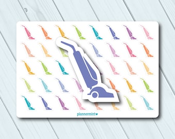 Puede incluir: Una hoja de pegatinas con una pegatina grande de aspiradora de color púrpura claro, con pegatinas de aspiradora más pequeñas en varios colores. Las pegatinas están sobre un fondo blanco, con el texto "plannermint" en la parte inferior.