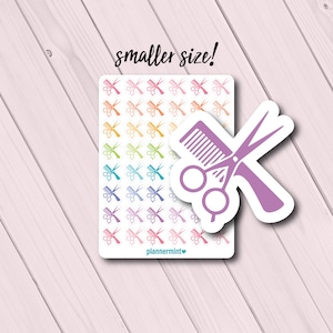 May include: A sheet of planner stickers with a repeating pattern of scissors and combs in various colors. A larger sticker of a comb and scissors is on the right. The text "smaller size!" is above the stickers.