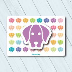 May include: A sheet of colorful dog stickers in various shades of pink, orange, yellow, green, blue, and purple. A large, purple dog sticker is centered on the sheet. The text "plannermint" is at the bottom.