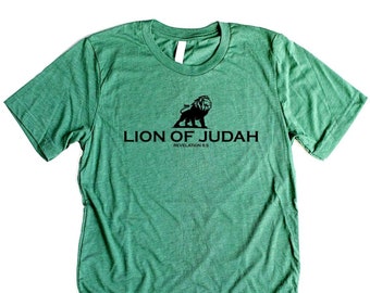 May include: A green t-shirt with a black lion graphic and the text "Lion of Judah" and "Revelation 5:5".
