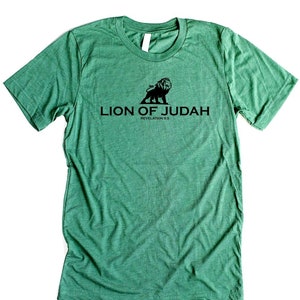 May include: A green t-shirt with a black lion graphic and the text "Lion of Judah" and "Revelation 5:5".