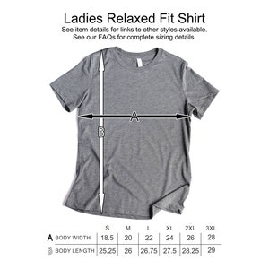 May include: A gray relaxed fit t-shirt with size chart showing body width and length measurements in inches.