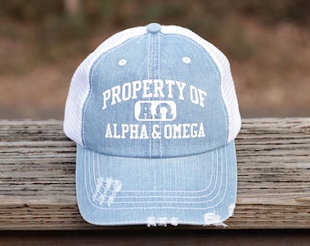 Property of Alpha & Omega Distressed Christian Trucker Hat for Men, Women, and Teens in Unstructured Denim Baseball Cap style with mesh back