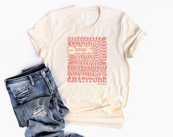 Dankbaarheid Col 2:7 Botanisch christelijk shirt voor dames in een unisex-stijl met een op geloof gebaseerde perzik tropische bloem en Bijbelvers graphic