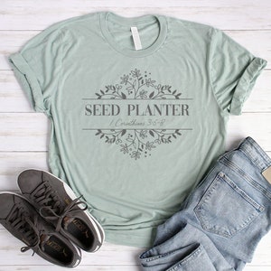 Floral Bible Verse Shirt Seed Planter Shirt Unisex Christian Shirts Women Flower Shirt 1 Corinthians 3:6-8 Faith Farmhouse Garden Shirt