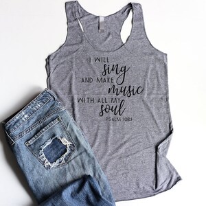 May include: Gray tank top with the text "I will sing and make music with all my soul Psalm 108:1" printed in black.