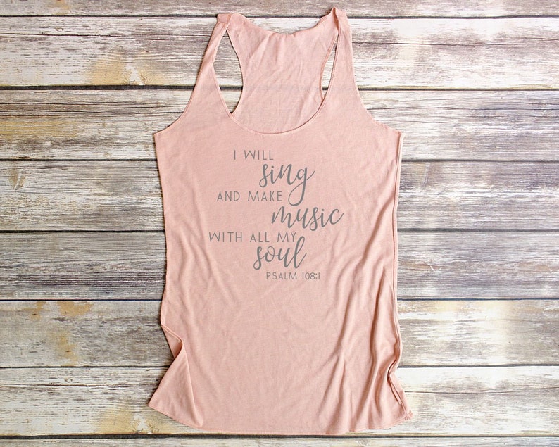 May include: A light pink tank top with the text "I will sing and make music with all my soul Psalm 108:1" printed on the front.
