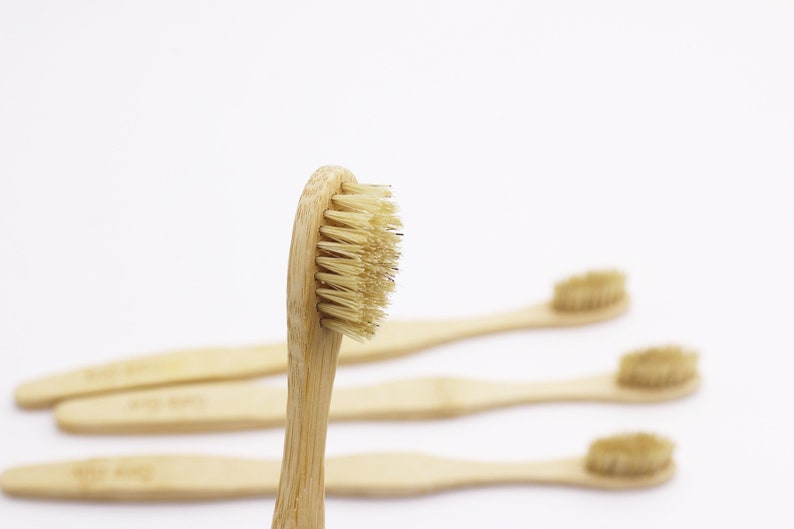 May include: Four natural bamboo toothbrushes with soft bristles. The toothbrushes are made from sustainable materials and are a great alternative to plastic toothbrushes.