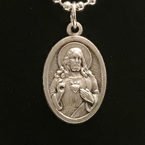 Collana con medaglia del Sacro Cuore e del Cuore Immacolato