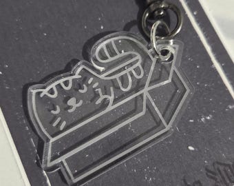 Small clear acrylic cat in box keychain