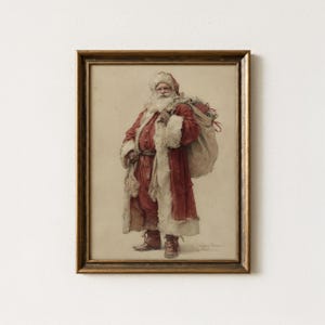 May include: Framed vintage print of Santa Claus in a red suit with white fur trim, carrying a sack of gifts. The artwork has a sepia tone and is set in a gold-colored wooden frame. A classic Christmas decoration.