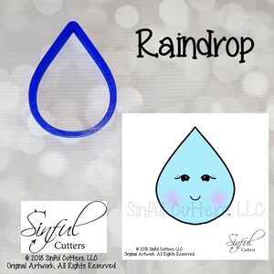 May include: A blue plastic cookie cutter shaped like a raindrop with a cute cartoon face. The cutter is designed for making cookies, fondant, or other edible crafts.
