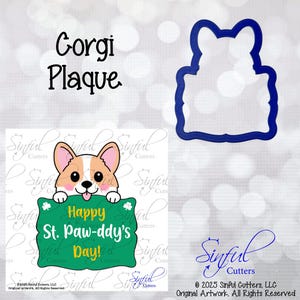 May include: A blue corgi plaque cookie cutter with a cartoon corgi holding a green sign that says "Happy St. Paw-ddy's Day!". The image also includes the text "Corgi Plaque".