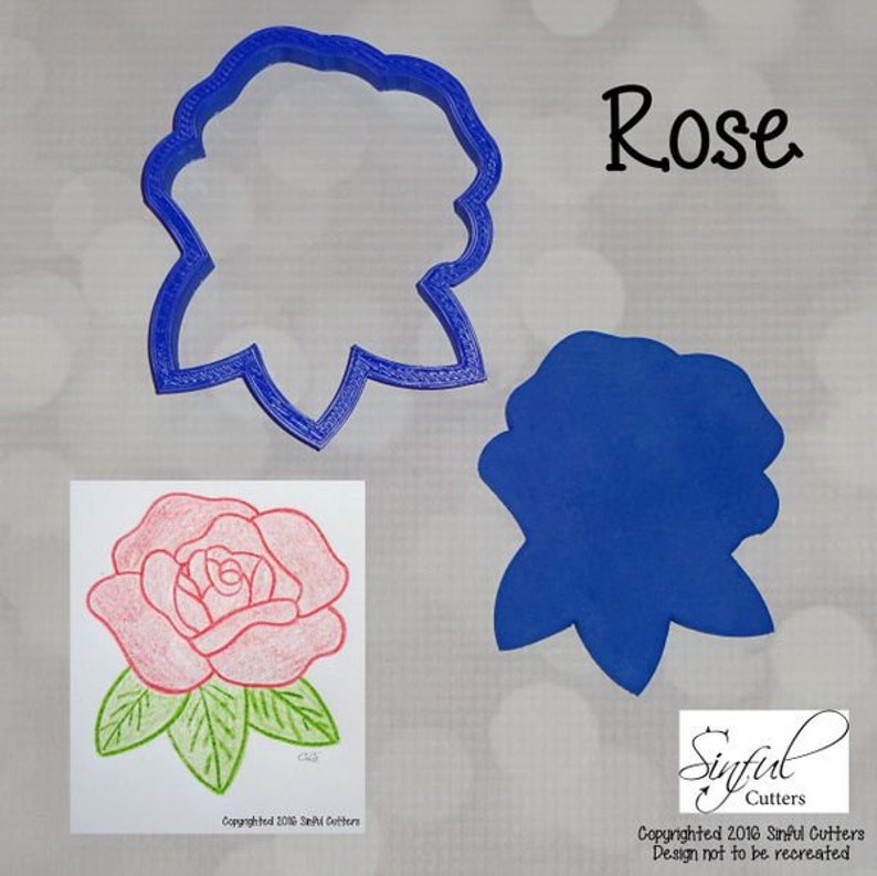 May include: Blue plastic cookie cutter in the shape of a rose. The cutter is shown next to a hand-drawn image of a rose on a white card. The card has the text "Copyrighted 2016 Sinful Cutters" printed on it.