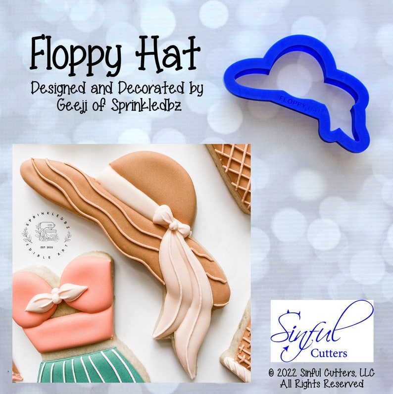 May include: A blue plastic cookie cutter shaped like a floppy hat. The cutter is labeled "Floppy Hat".