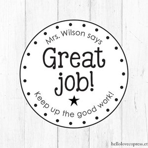 May include: Black and white circle sticker with the text "Mrs. Wilson says Great Job! Keep up the good work!" and a star in the centre.