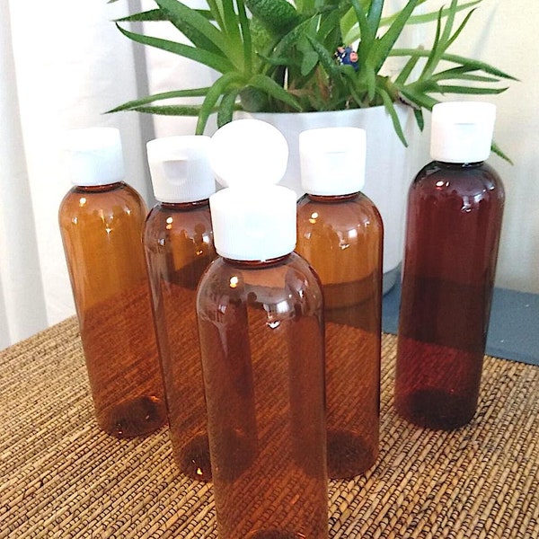 Set of 10: 4OZ Amber color PET "Cosmo" style bottles with flip top pour cap.